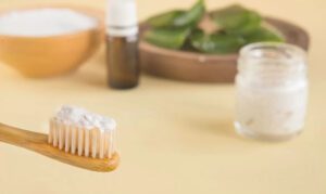 Toothbrush with CBD toothpaste on top